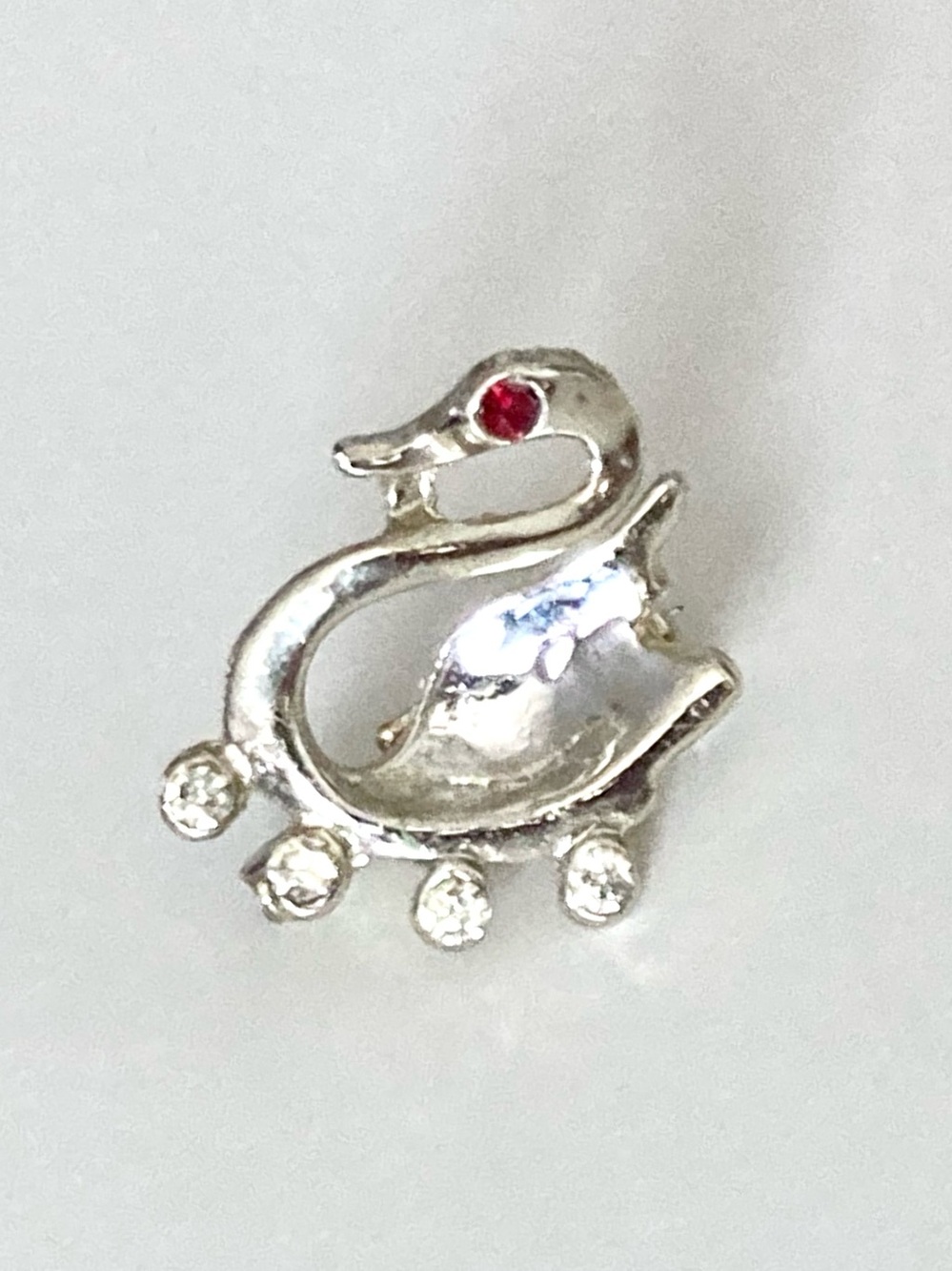 Vintage mini swan pin .75” red rhinestone eye